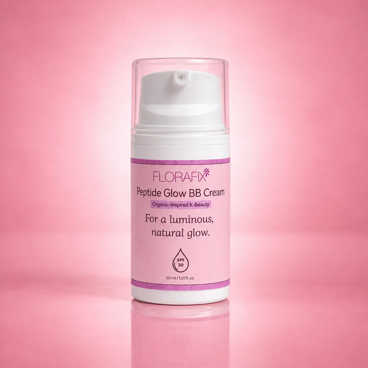 A bottle of FLORAFX Peptide Glow BB Cream with a white pump and clear cap, set against a soft pink gradient background with a subtle reflection.